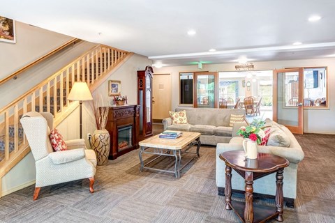 a living room with a couch and a table